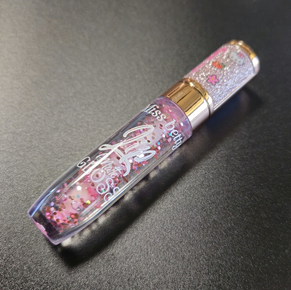 Lip gloss, brand new in a beautiful container